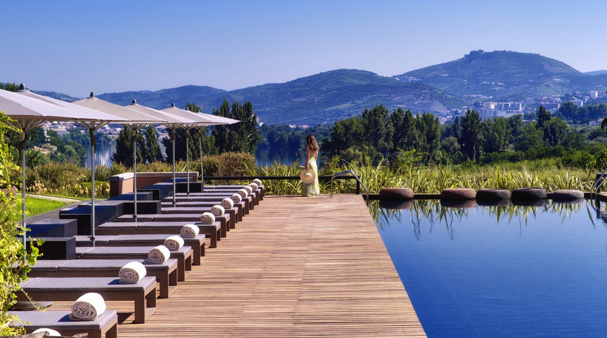 Swimming pool with model at the hotel six senses douro
